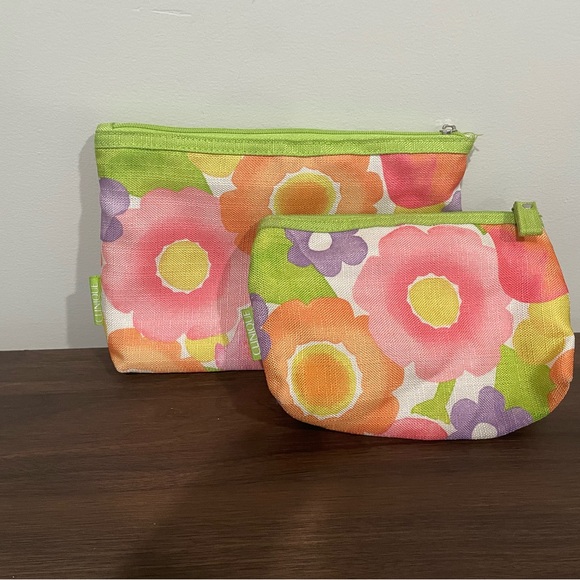 Clinique Handbags - {Clinique} Pair of 2 floral cosmetic bags